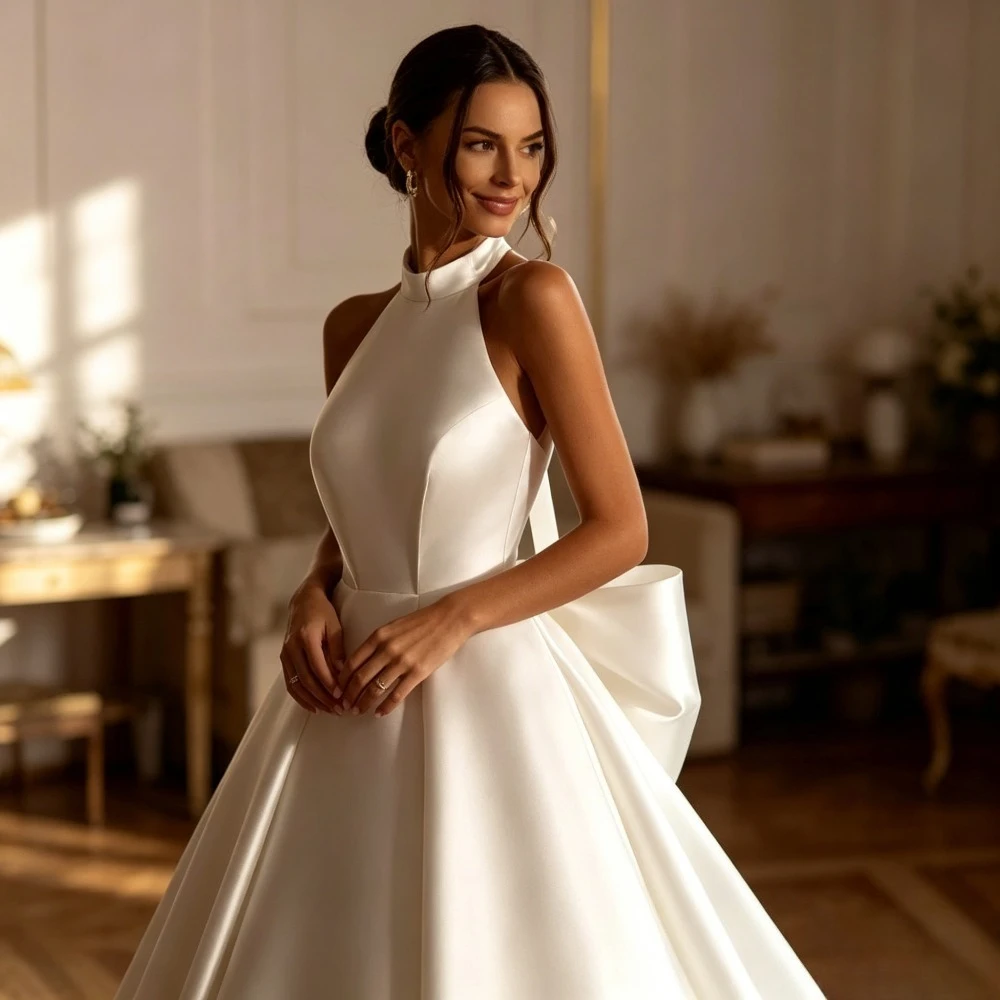 Customized Minimalist Hanging Neck Satin A-line Wedding Dresses White Elegant Sleeveless Slim Fit Bridal Gown with Oversized Bow