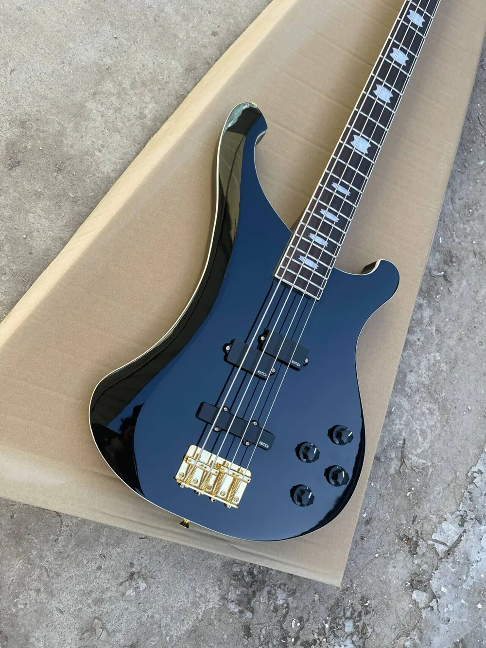 

Black 4 Strings Electric Bass Guitar with Rosewood Fingerboard,Gold Hardware,Provide customized service