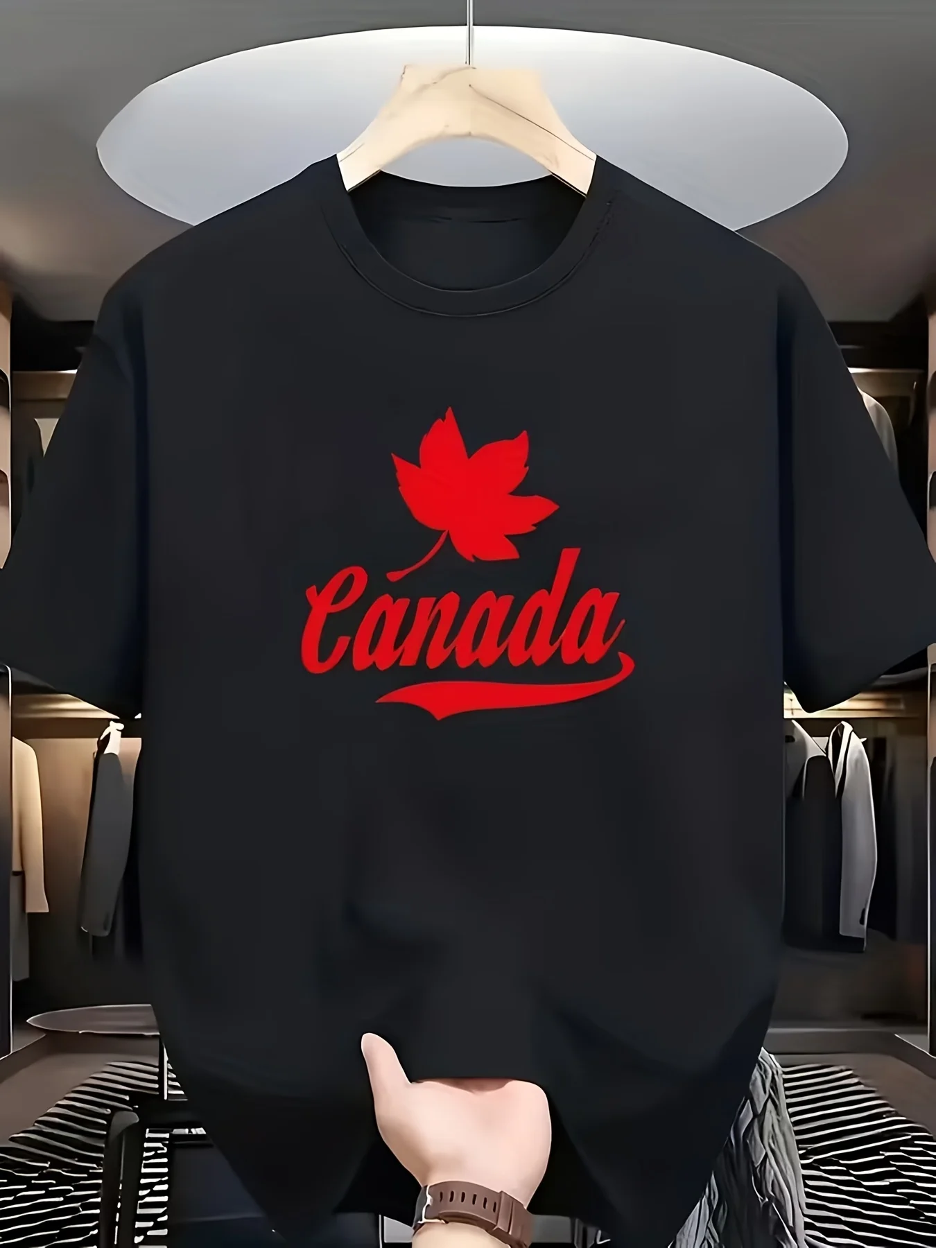 

Men's Canada-themed T-shirt, printed with maple leaves and the word "Canada"