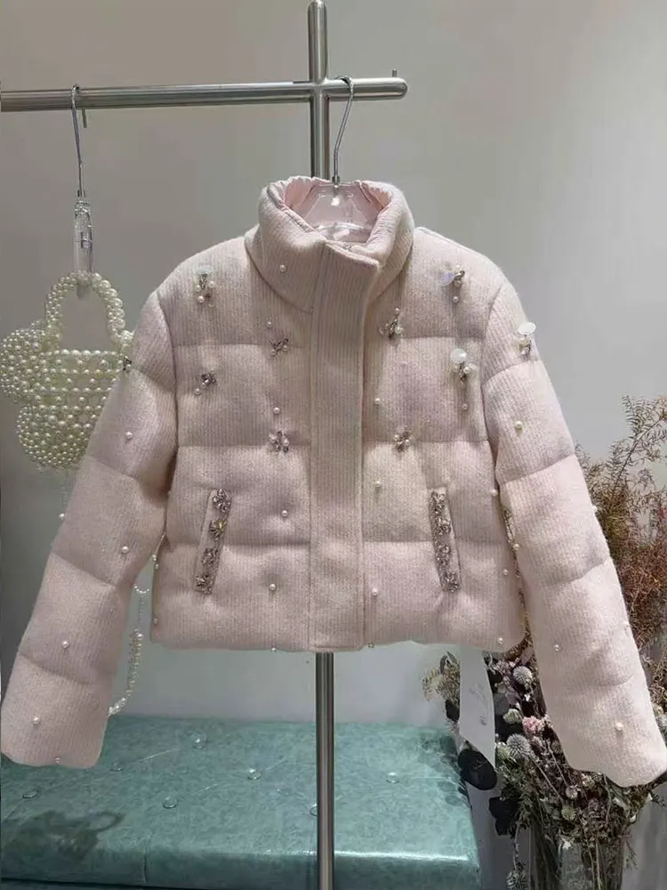 Рисунок 4 - Женские зимние новые модные пуховые пальто 202