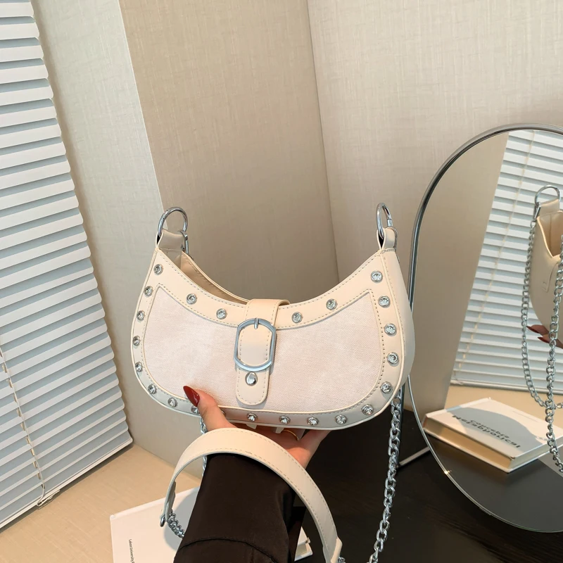 

Handheld Fashion Motorcycle Style Dumpling Bag for Women's 2024 Summer New Korean Edition Trendy Versatile Casual Crowd Crossbod