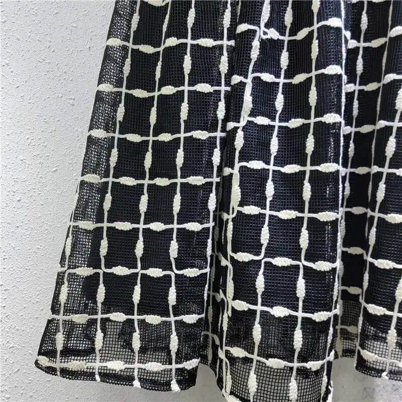 Maille crochet creux fleur grille conception Style jupe tempérament fée tout-match robe pour les femmes printemps nouvelle marée