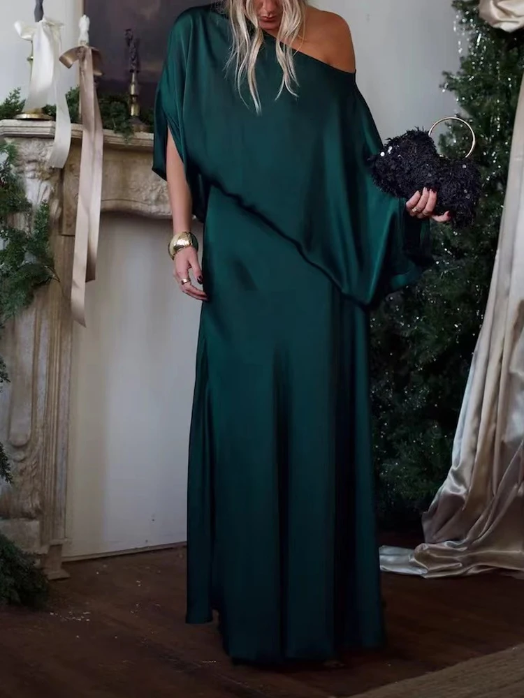 

Элегантный атласный костюм из двух предметов: топ с асимметричным вырезом и юбка, однотонный, для банкета, с высокой талией