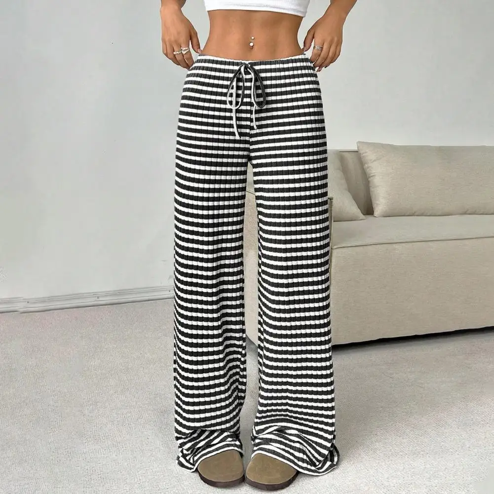 伸縮性のあるウエストと調節可能なドローストリング付き カジュアルなルーズフィット 軽量で通気性のあるズボン 毎日のオフィス、休暇、週末の着用に最適