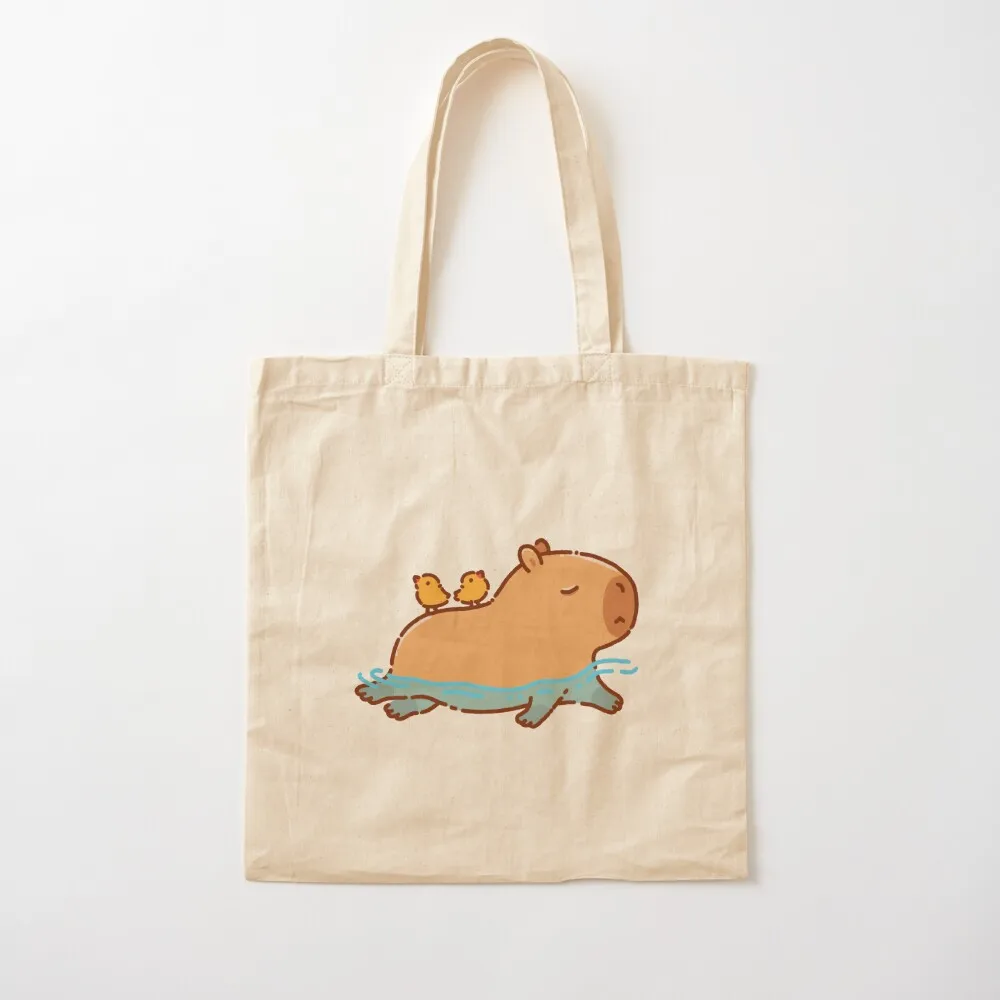 

Capybara swimming with two birds on his back Tote Bag shopper bag woman eco pack Canvas Tote Bag