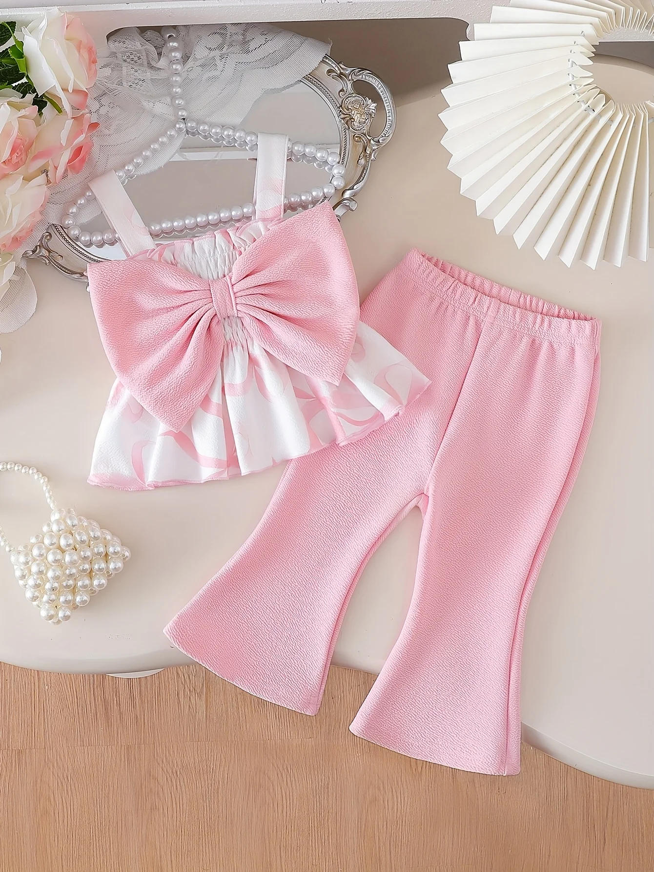 

Летний комплект из 2 предметов для девочек: топ на бретельках с большим бантом и рюшами + расклешенные брюки | Подарок на День святого Валентина / Подарок на день рождения для девушки