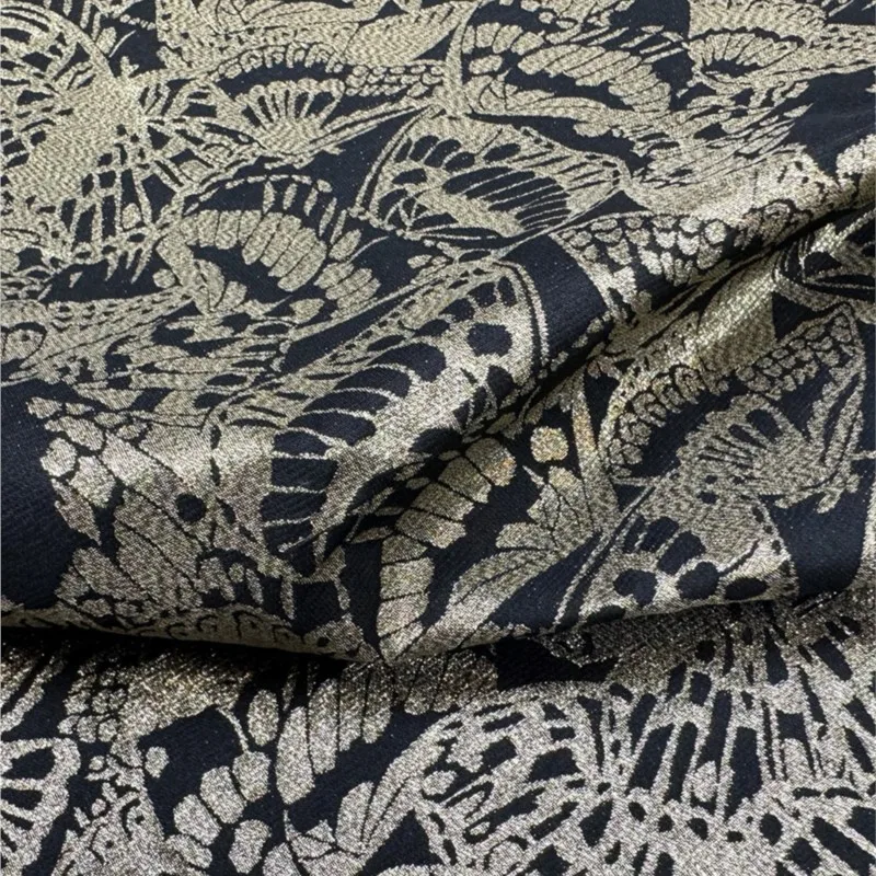 

Black and gold jacquard windbreaker fabric firm dress set brocade satin handicraft packaging