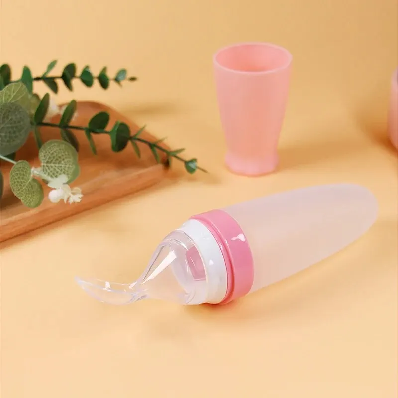 1 Pcs Baby Rice Cereal Bottle Dropper Feeding Squeeze Spoon Soft Silicone Spoon Cute Rocket Shape Soft Non Slip Feeding Bottle