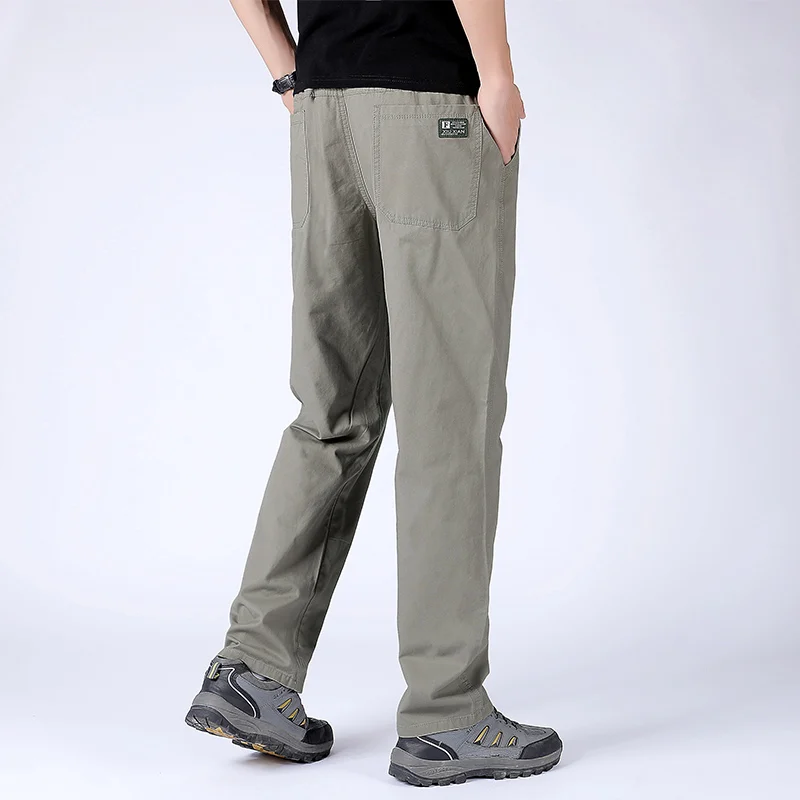 กางเกงขายาวผู้ชายผ้าคอตตอนเนื้อบางระบายกางเกงผู้ชายขาสามส่วนหลวมกางเกงขายาวแนวสตรีทแวร์สีล้วนใหม่ฤดูร้อน