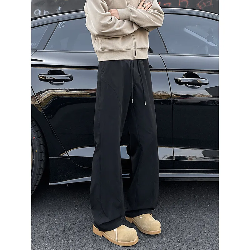 

New men's casual pants. They are versatile, loose-fitting and slightly flared long pants in a Korean style.