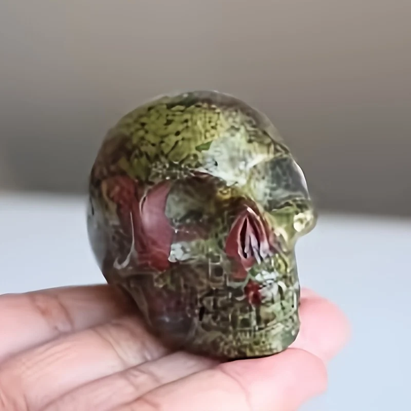 One Unique Dragon Blood Stone Skull Head - a Bohemian-Style Carved Dragon Bone Decoration Featuring Red And Green