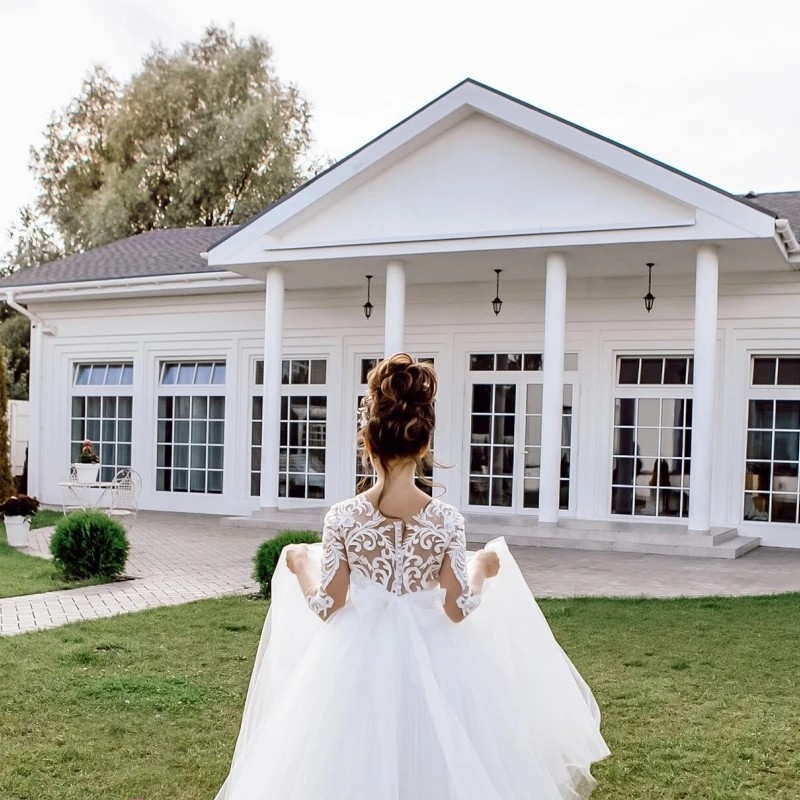 Abiti da ragazza di fiori bianchi Tulle motivo bianco con fiocco e coda manica lunga per abiti da prima comunione per la festa di compleanno di nozze