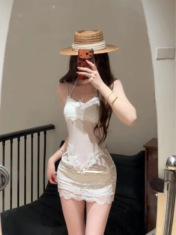 

Комплект из двух предметов: кружевное бикини и топ Pure Desire. Высококачественный купальник для горячих источников. Элегантный, модный, из полиэстера.