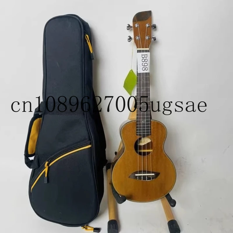 

Ukulele 23 inch full peach blossom heart wooden crate beginner's entry wooden guitar with thick bag