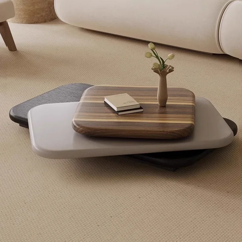 

Italian minimalist designer high-end rotating coffee table living room 2025 new creative, special-shaped coffee table