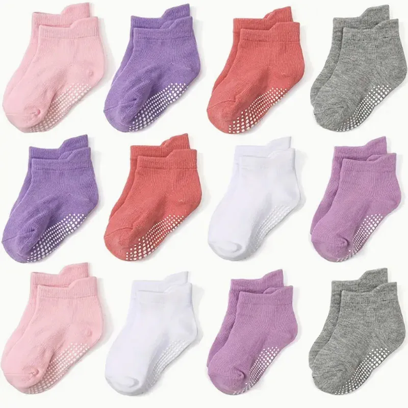 6 pairs of girls' anti slip socks, adhesive point socks, and short socks with anti drop heel design at the back. Girls' toddler