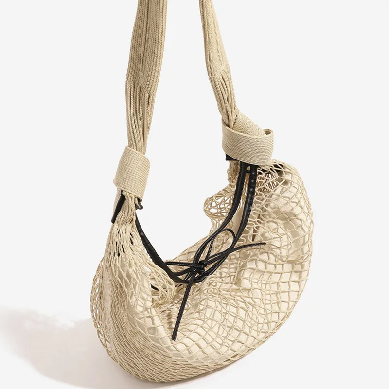 

2026 New Korean Net Pocket Woven Shoulder Bag Women's Summer Dumpling Shape Design Casual Hollow Beach Waist Bag Shopping Bag