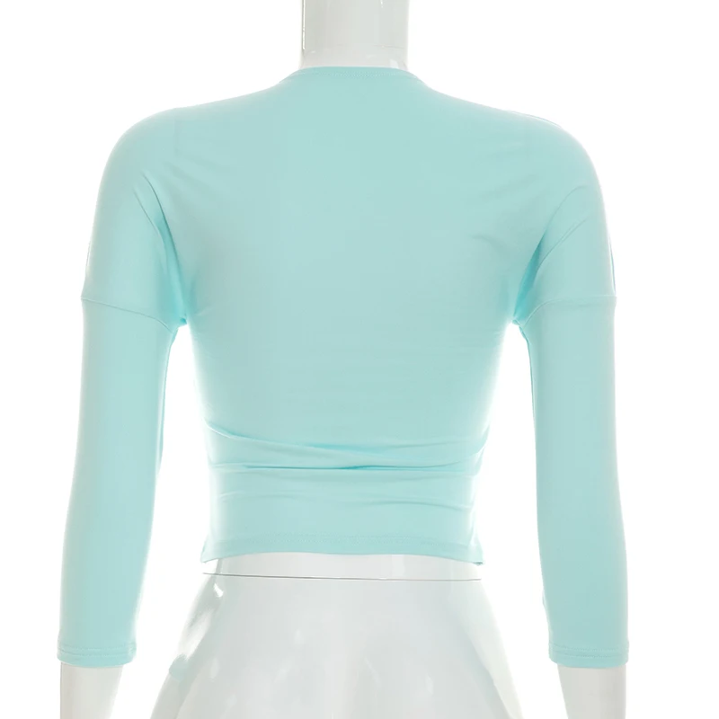 Sexy, schmal geschnittenes, einfarbiges Oberteil mit tiefem Ausschnitt, sieben Viertelärmeln und Patchwork-Details, das die Taille betont. – Detail 10