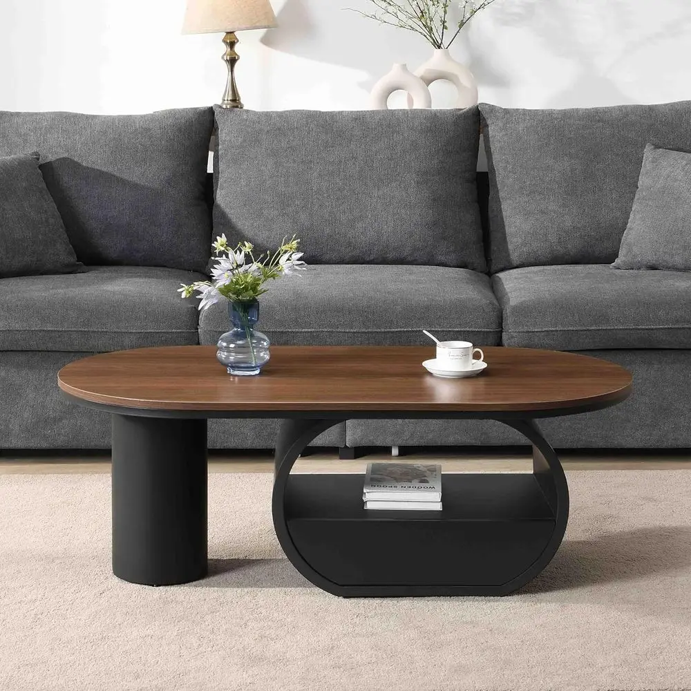 

Brown Wooden Oval Coffee Table with Storage Drawer and Black Base for Luxurious Living Room Accent
