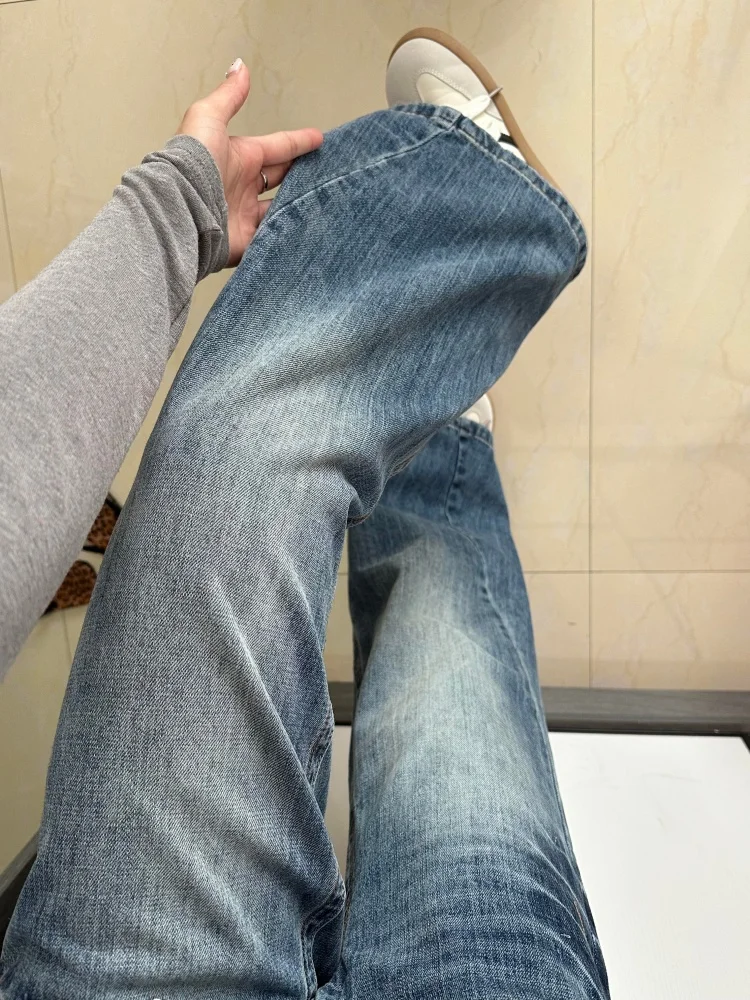 Damskie jeansy plus size w stylu retro z szerokimi nogawkami, ocieplane, luźne, nie obcisłe, wyszczuplające spodnie dzwony na jesień i zimę.