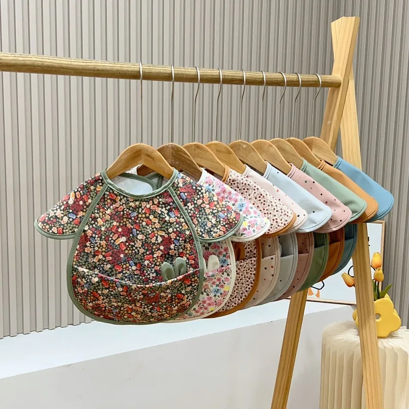 nuevo-babero-de-manga-corta-para-bebes-impermeable-y-resistente-a-las-manchas-con-bolsillo-ajustable-con-estampado-de-dibujos-animados