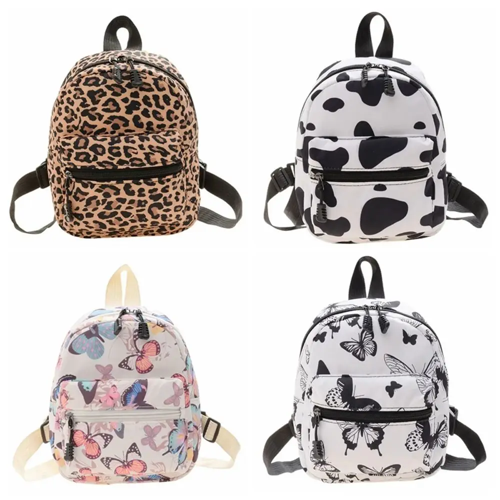 Mochila leopardo feminina mochila de ombro de alta capacidade pequeno saco de livro mini vaca impressão sacos escolares viagem