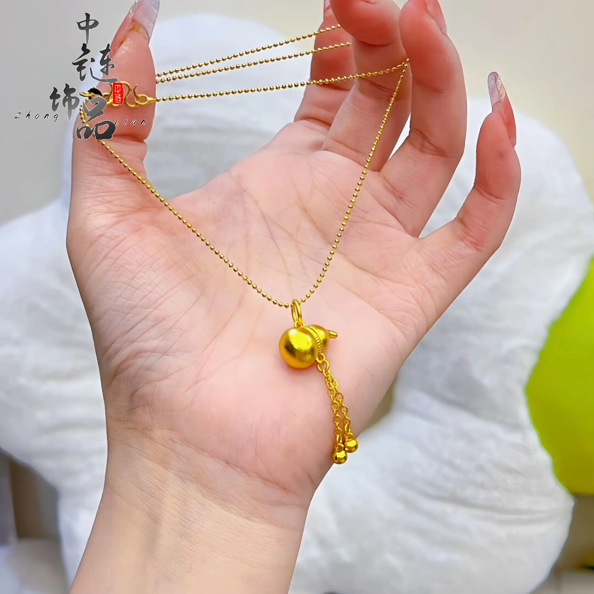 9999 gold high-color retention fringed small gourd pendant. New Chinese-style traditional gourd pendant for wholesale.