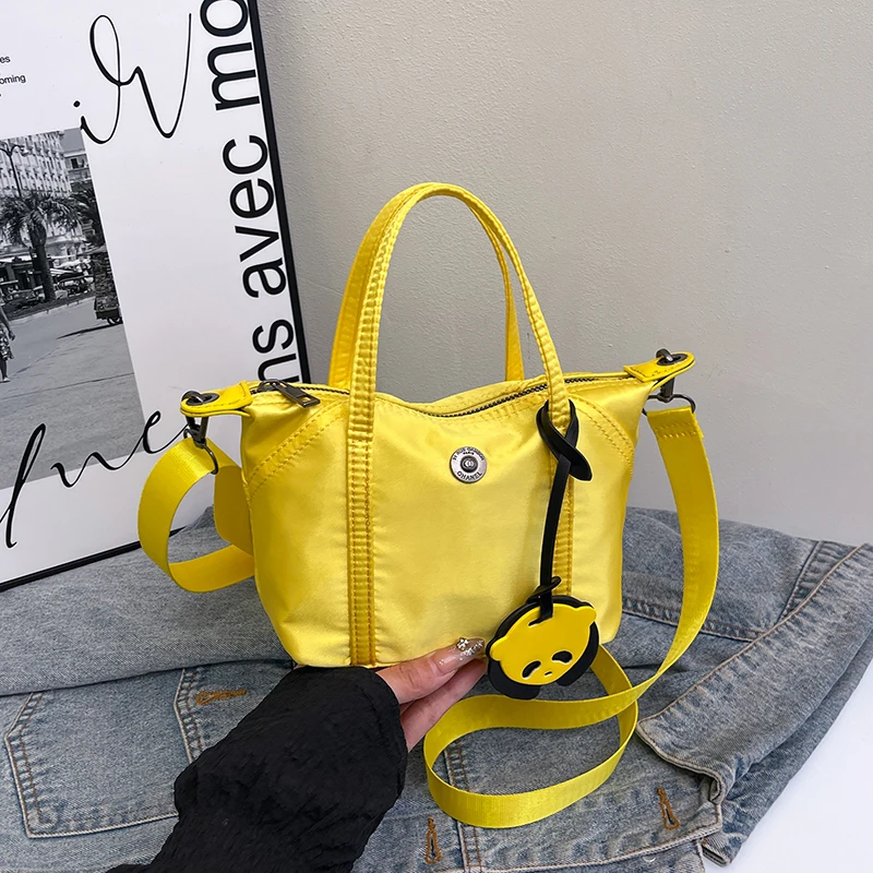 

Tot 2025 New Faion Универсальная маленькая сумка Luy Color, нейлоновая сумка на одно плечо, сумка для пельменей, цвет среднего размера