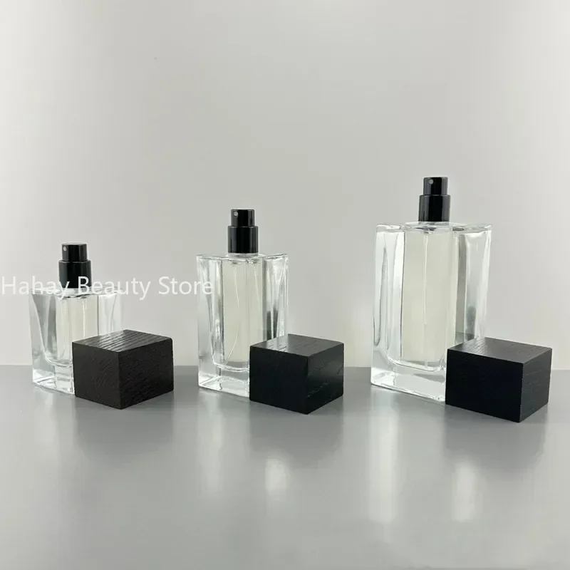 30ml/50ml/100ml przezroczyste szklane butelki perfum butelki z rozpylaczem puste kwadratowe butelki zaciskane Nick butelka perfum niezbędne w podróży