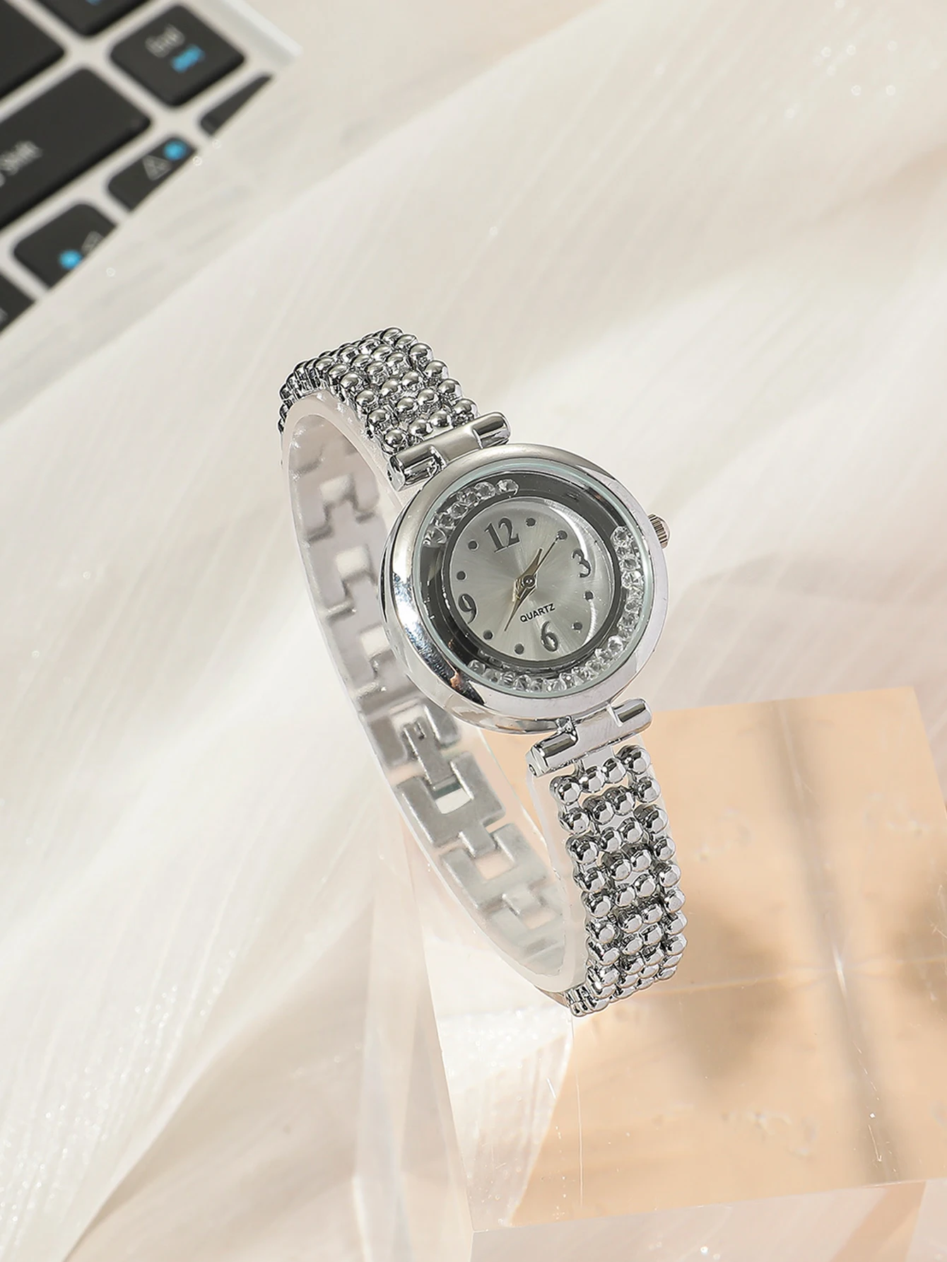 A Silver Stylish Lady With Rhinestone Quartz Bracelet Watch And A Plum Bracelet Accessory. Can Be Used In Daily Life