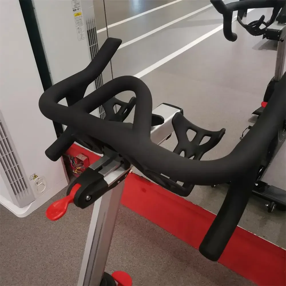 Vélo à rotation magnétique avec cadre en acier fin, équipement de gymnastique dynamique, vélo cardio pour l'entraînement, approvisionnement direct d'usine