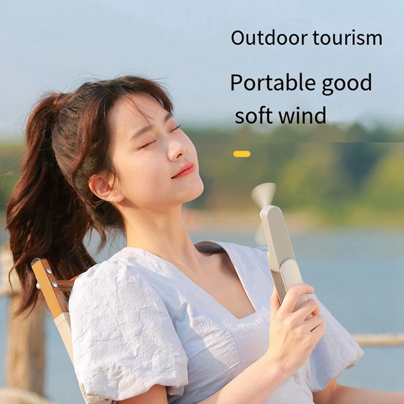 USB พัดลมแบบมือถือแบบพกพาขนาดเล็กเงียบชาร์จตั้งโต๊ะพัดลมแบบพับได้พัดลมขนาดเล็กและเรียบง่าย