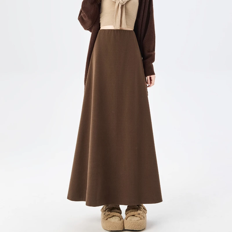กระโปรงขนสัตว์คุณภาพสูงสำหรับผู้หญิง ฤดูใบไม้ร่วง ฤดูหนาว ดีไซน์หรูหรา ทรงเอ หนา สีดำ กระโปรงผู้หญิง เอวยางยืด ทรงตรง แฟลดาส 2025