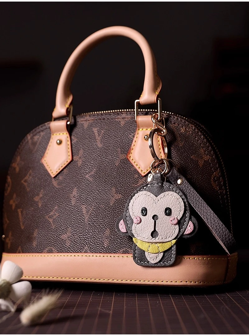 จี้รูปลิงน้อย, จี้กระเป๋าหนังแกะฝรั่งเศส, จี้โทรศัพท์, พวงกุญแจหนังแท้ทำมือ