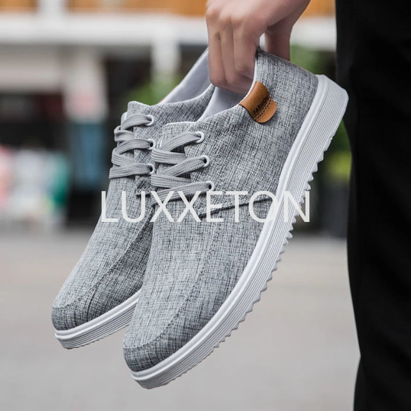 Men Canvas Breathable Vulcanized Shoes Spring New Fashion Lace Up Breathable Casual Non Slip Wear Resistant Sports Shoes