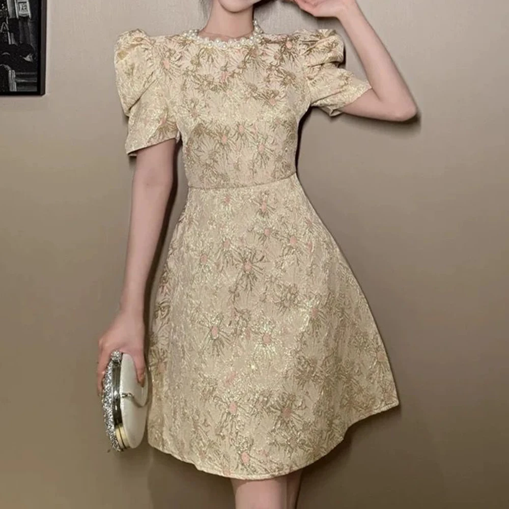 

2026 summer new retro crew neck women's French bubble jacquard waist floral dress temperament