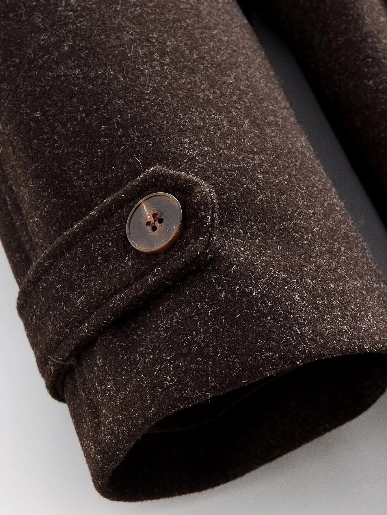 2025 Inverno Nuove donne Abbigliamento Moda casual Semplice ed elegante Trench lungo stile di fascia alta con cravatta in vita