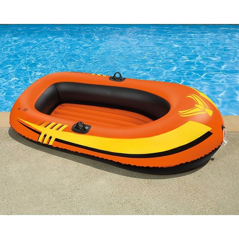 

Adventurer two-person inflatable boat with paddles and air pumps