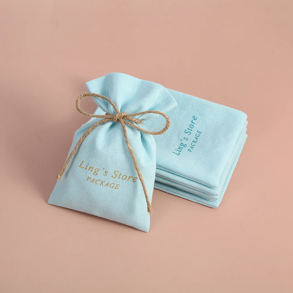 100 pièces bleu bijoux sac 7x9 cm faveurs de mariage cadeau coton toile pochettes belle Festival fête cadeaux d'anniversaire emballage conteneur