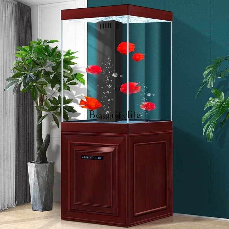 FG-*The new Chinese fish tank is free of change next to the TV cabinet in the living room.