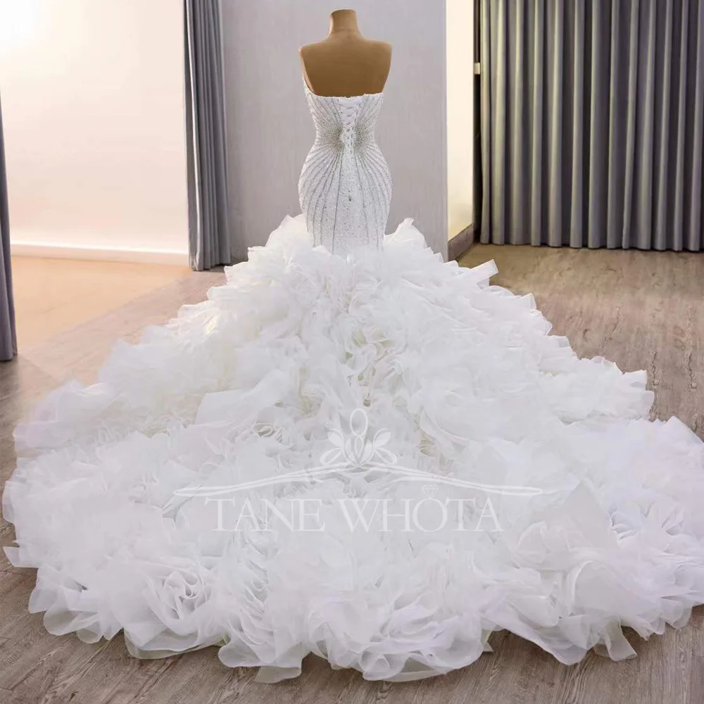 ชุดแต่งงานแบบไม่มีแขน ดีไซน์เซ็กซี่หวานซึ้ง ประดับด้วยลูกปัดและเลื่อม แต่งเชือกผูกด้านหลัง ทรงเข้ารูป สามารถสั่งตัดได้ สวยสง่างาม ทันสมัย