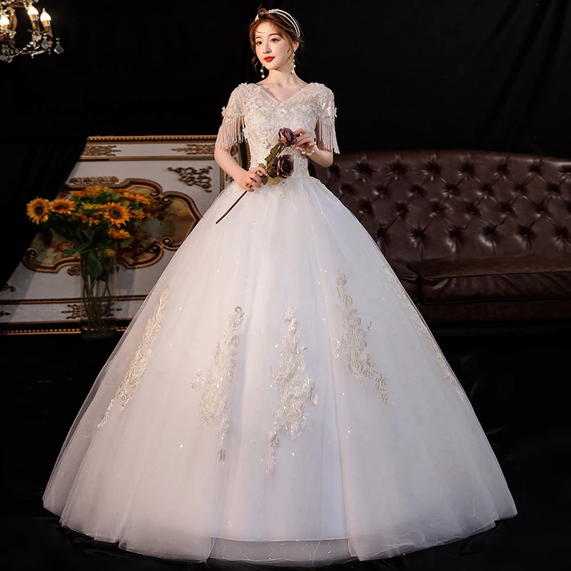 คลาสสิก V คอชุดแต่งงานกับพู่ Elegant Lace Applique Tulle Sukienka Na Wesele ชุดเจ้าสาวใหม่ที่กําหนดเอง