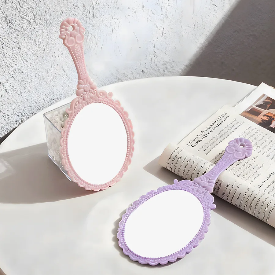 مرآة محمولة بيضاوية أوروبية عتيقة، مقبض زجاجي صغير من جانب واحد مدمج للمحفظة والسفر