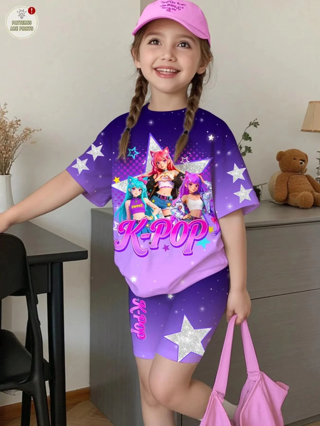 Girls' two-piece set featuring a purple gradient, anime-style star print, and Korean-inspired aesthetic; includes a crew-neck