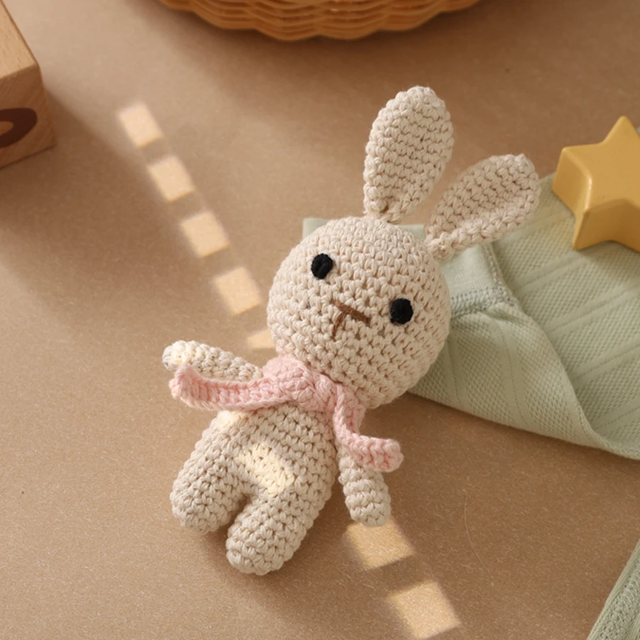 

Handmade crochet cartoon bow tie rabbit, finished crochet hook new cute rabbit, shakes the bell and emits a soothing sound