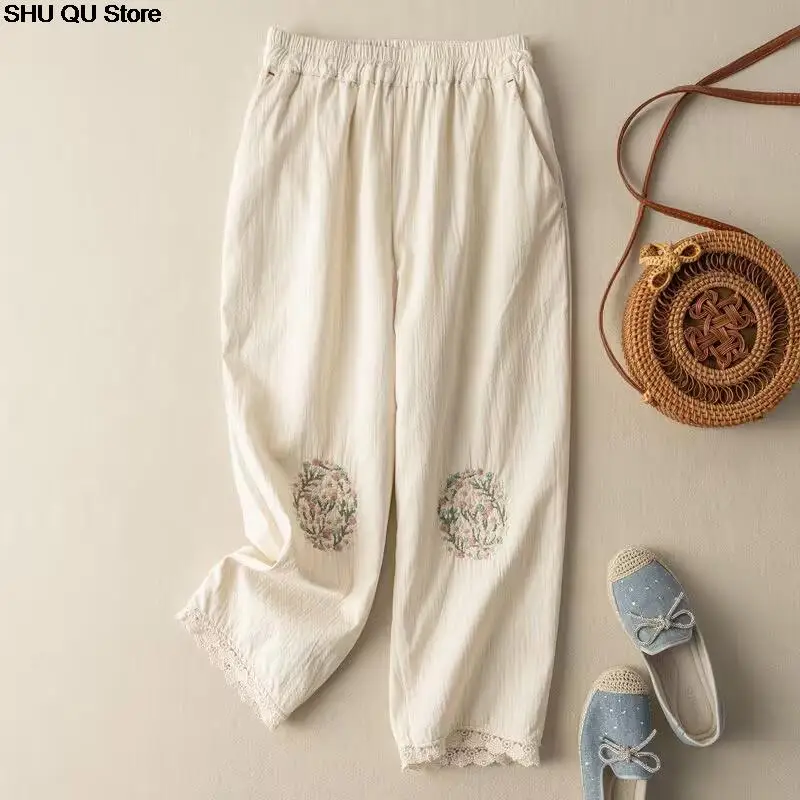 New Cotton and linen embroidered casual pants women's summer new fashion literary retro loose lace lace nine-point harem pants