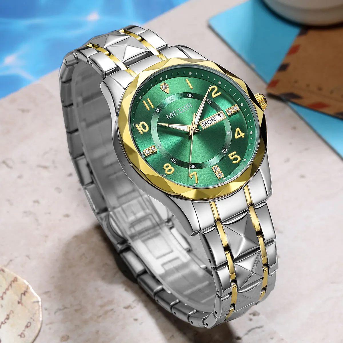 ساعة كوارتز رجالية أنيقة وبسيطة من MEGIR مع عرض تاريخ اليوم وحزام من الفولاذ المقاوم للصدأ وحافظة من خليط معدني للسيدات