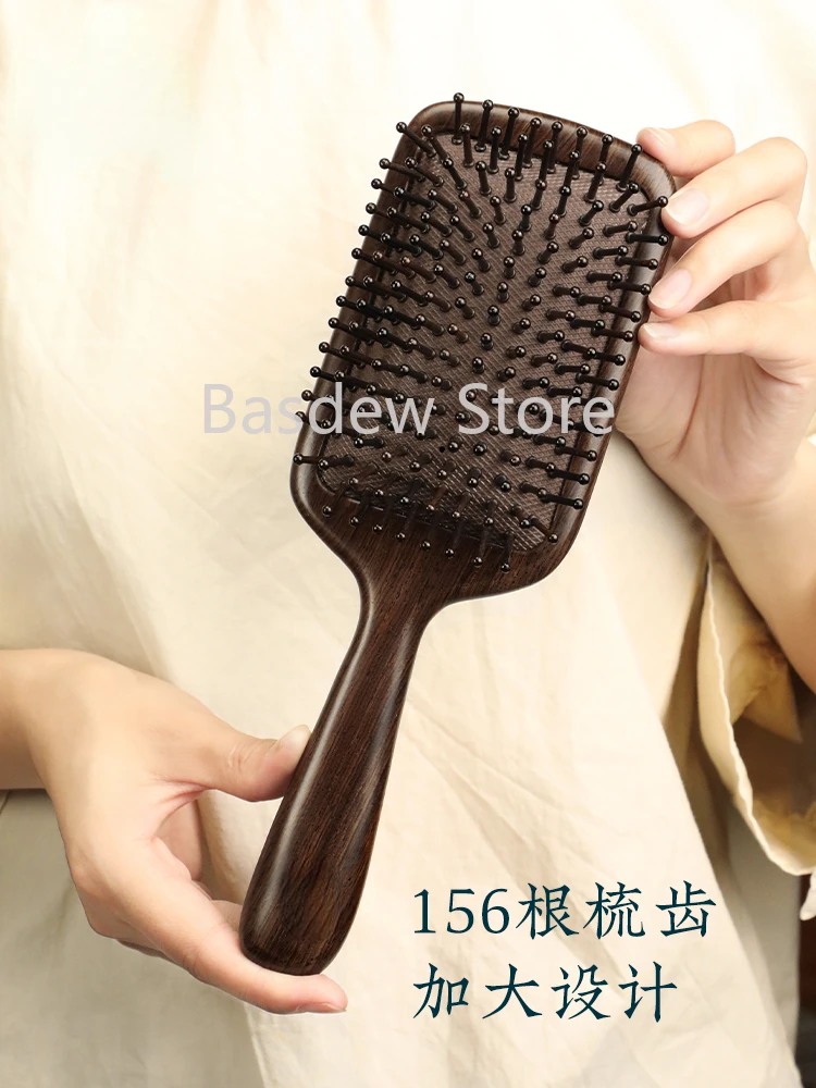 Ebony air bag comb comb massage head