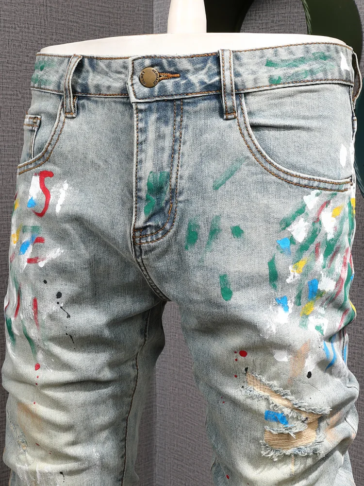 

Spring and summer vintage jeans men, painted graffiti print, perforated elastic,, small feet, nostalgic pants