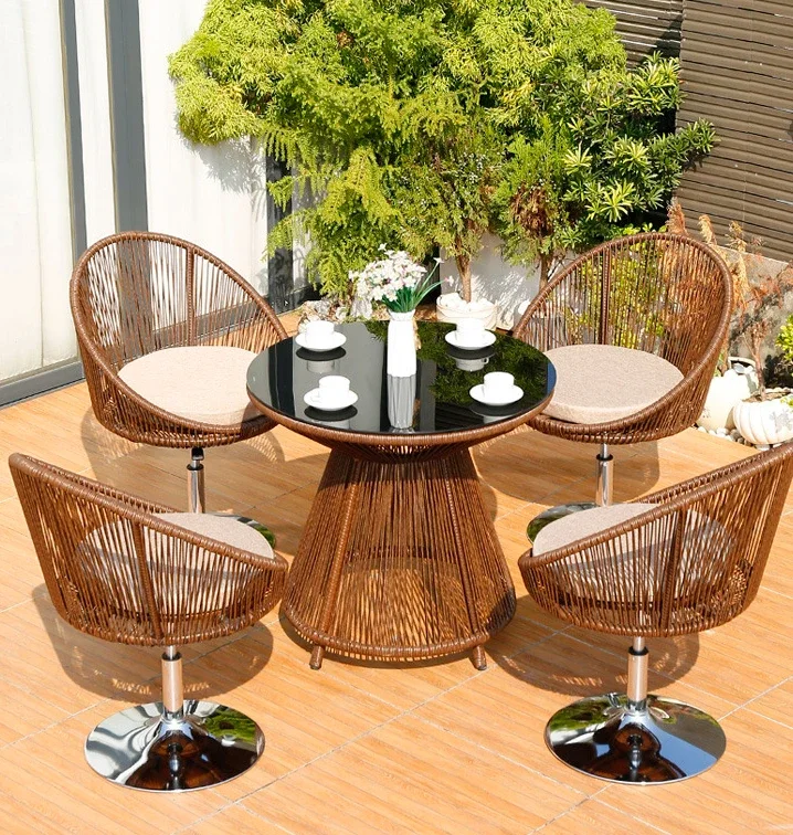 

Rattan small table and chair combination swivel chair outdoor balcony furniture net red rattan chair
